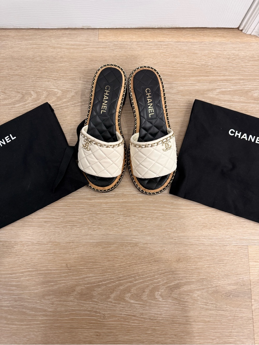 CHANEL Interwoven Leather Mules